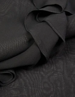 Blouse noire fluide à jabot et volants Femme