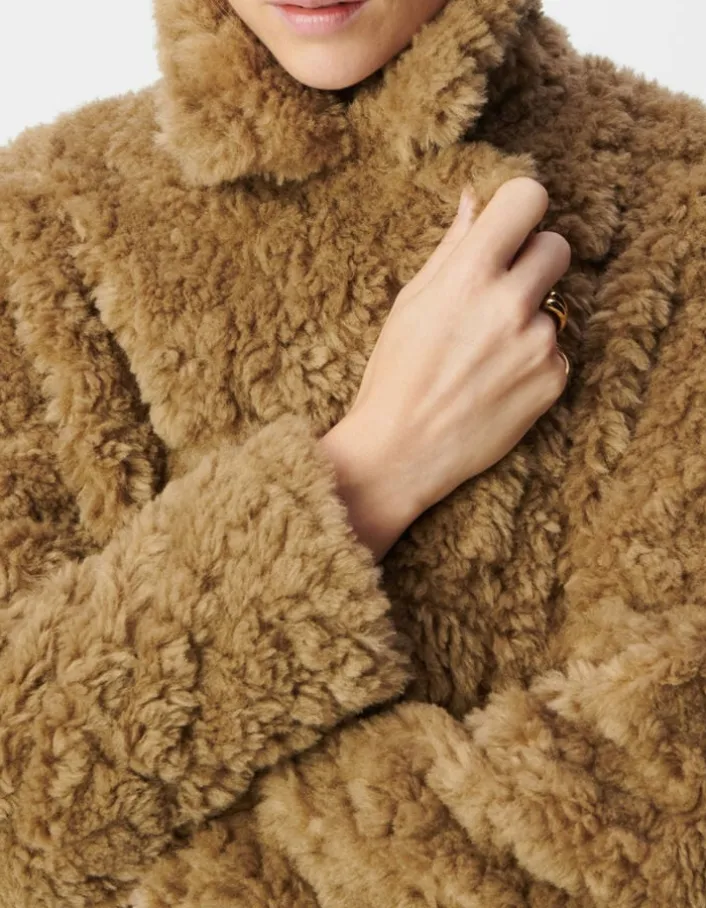 Manteau beige à poils longs Femme