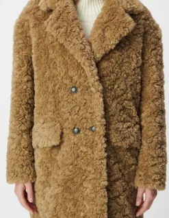 Manteau beige à poils longs Femme