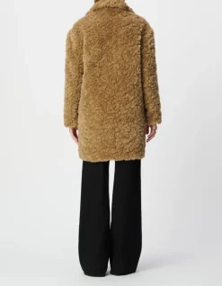 Manteau beige à poils longs Femme