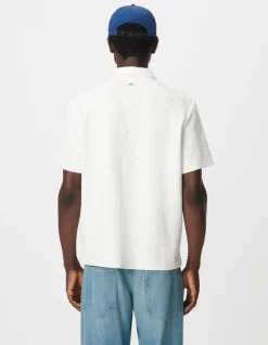 Polo zippé blanc jacquard carreaux Homme
