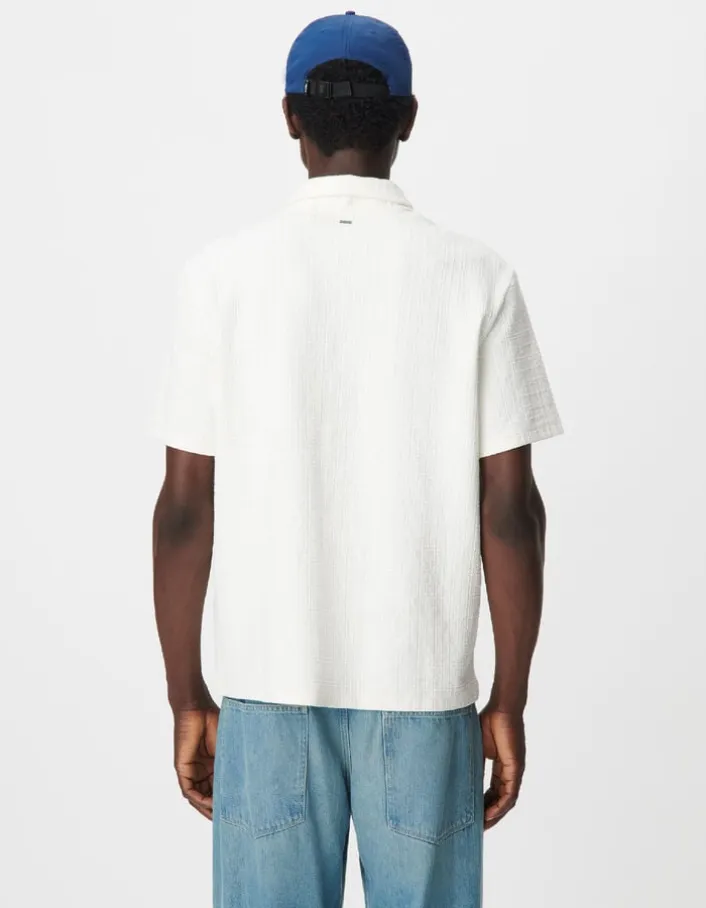 Polo zippé blanc jacquard carreaux Homme
