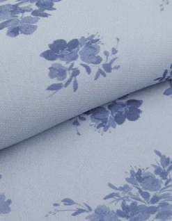 Robe fluide bleue imprimé fleurs à nouer côté Femme