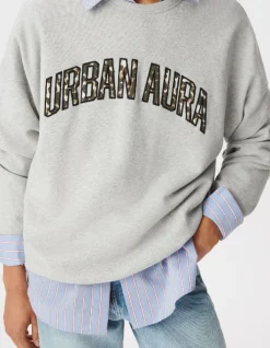 Sweat gris broderies message Femme